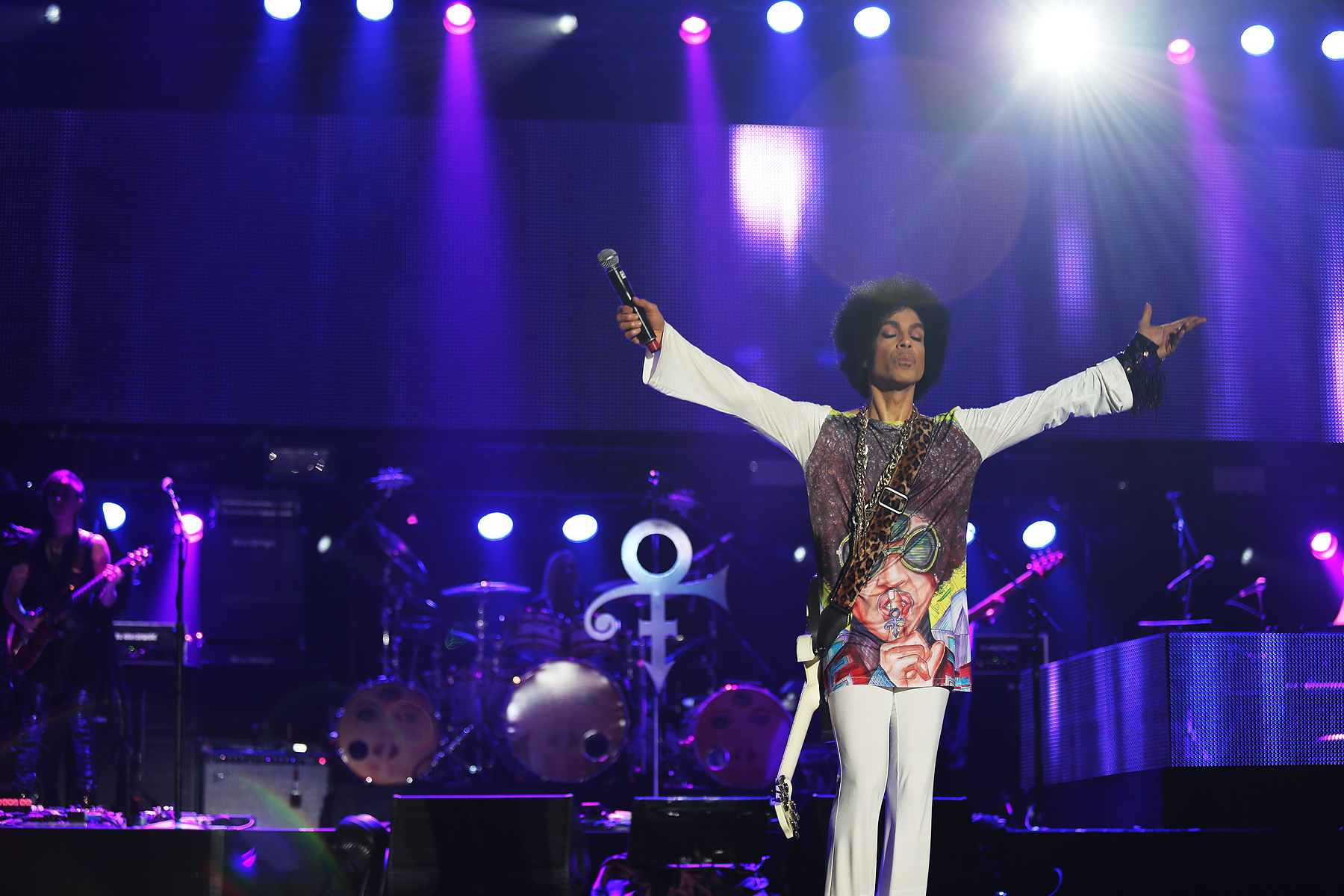 prince live with symbol in the background